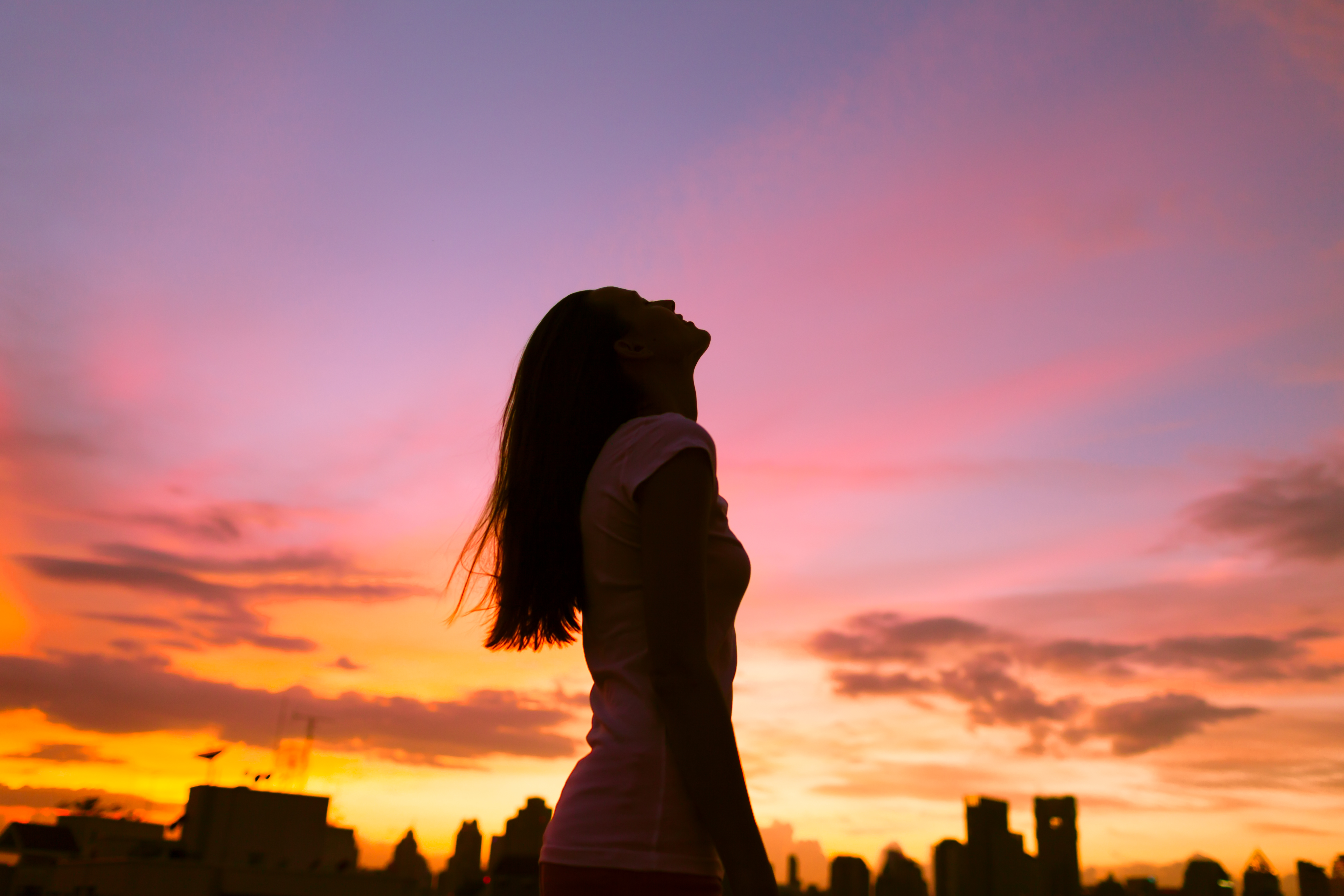 Woman Looking at Sunset